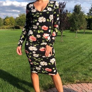 Club L knee length black floral dress.